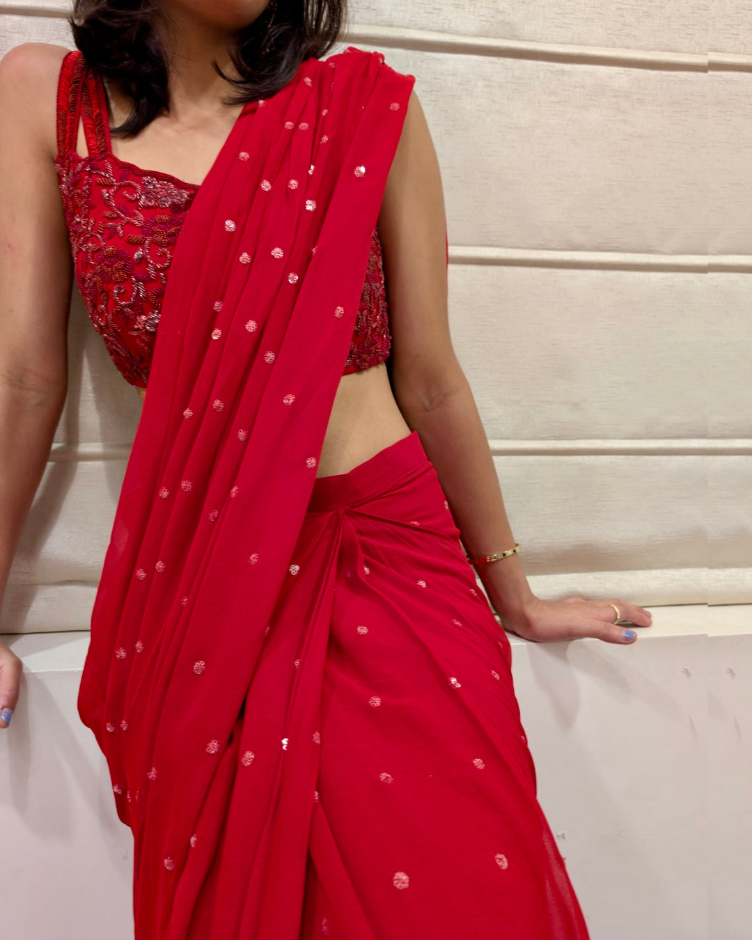 The Classic Red Pre-Draped Saree with Hand-Embroidered Blouse