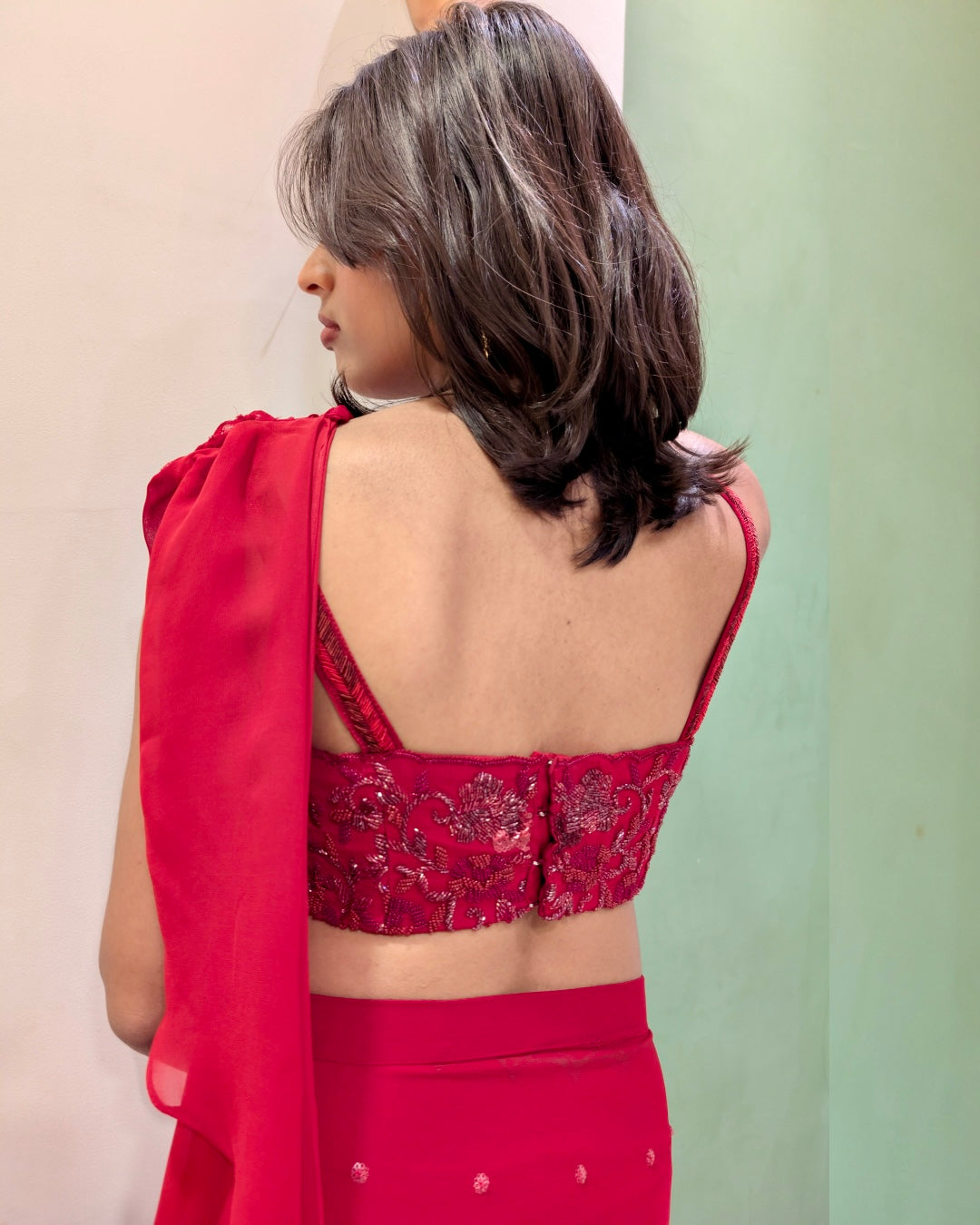 The Classic Red Pre-Draped Saree with Hand-Embroidered Blouse